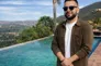 Benjamin Soleimani, known as Benj, by the pool for a VenueMagnet spotlight article
