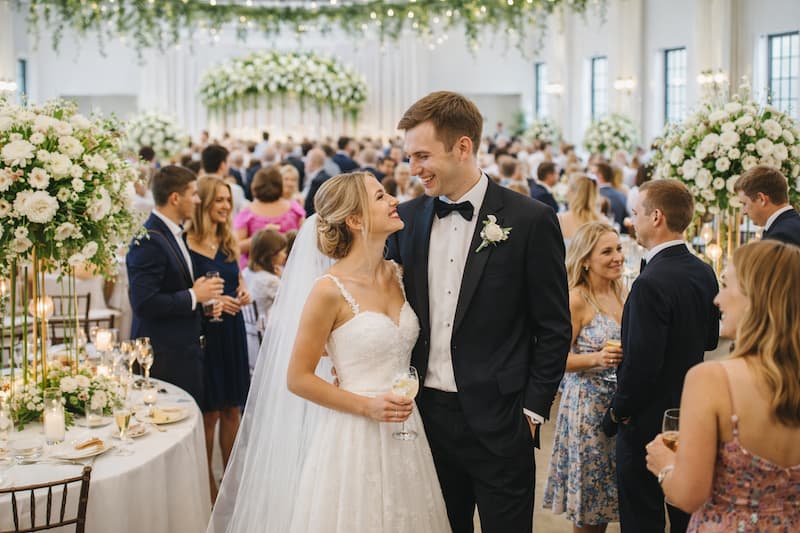 Commercial event venue setup with tables and lighting for an event