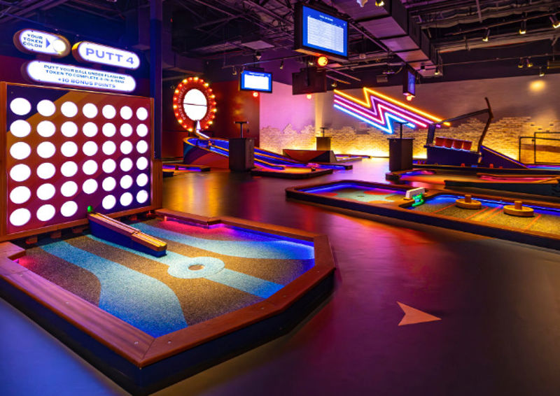Modern Mini Golf Venue with Private Rooms and Game-focused Layout
