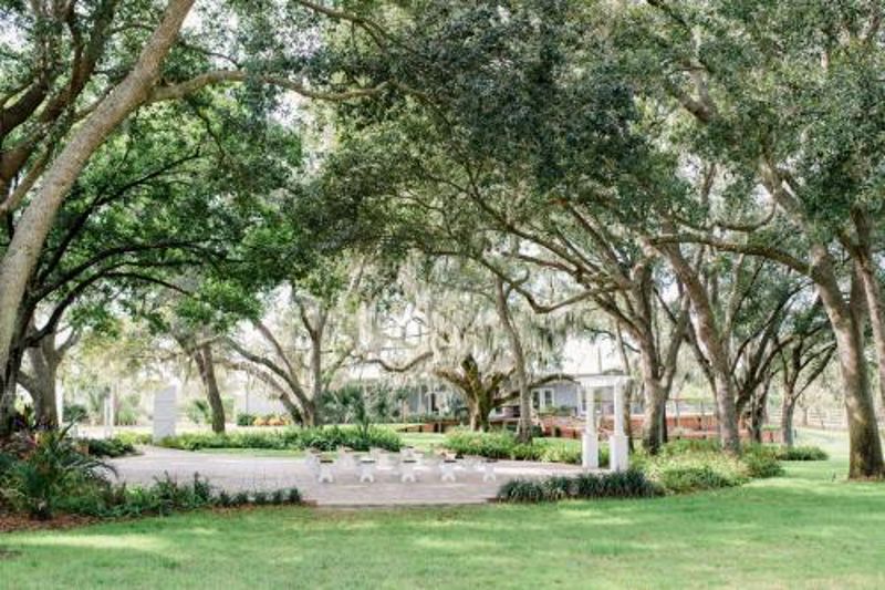 Oak-covered Farm Venue with Boathouse, Porches and Getting-ready Suite