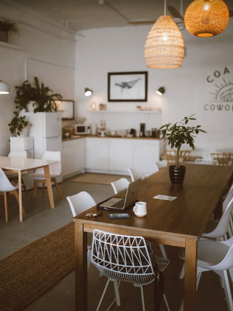Bright Coastal Coworking Lounge with Natural Light, Phone Booth, and Flexible Seating