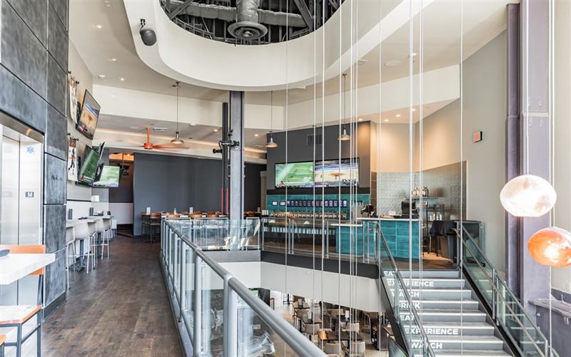 High-Energy Sports Bar With 50 Beer Taps and Flexible Private Zones