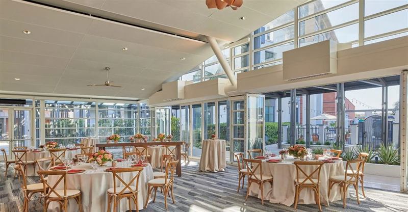 Expansive Hotel Venue with Ballrooms, Natural Light, and Outdoor Spaces