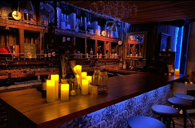 Private Speakeasy Bar Lounge with Vintage Decor and Custom Lighting