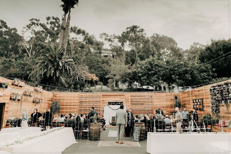 Open-air Mission Valley Event Venue with Palm Trees and Covered Reception Space