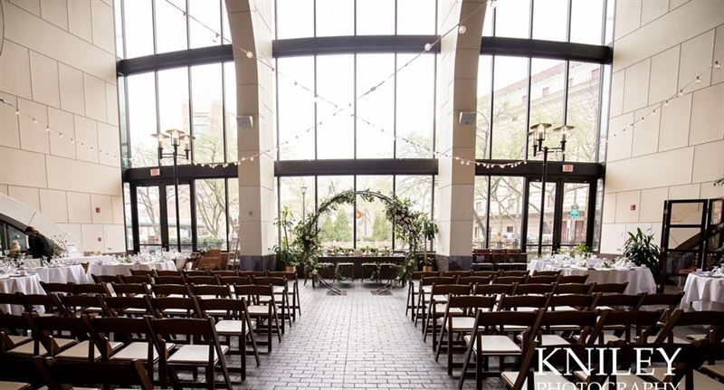 Glass Atrium Restaurant With Courtyard for Private Events