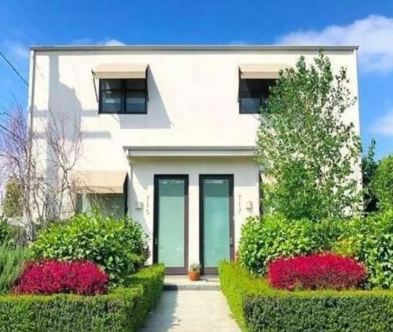 Contemporary Duplex with Natural Light, Fireplace, and Flexible Rooms