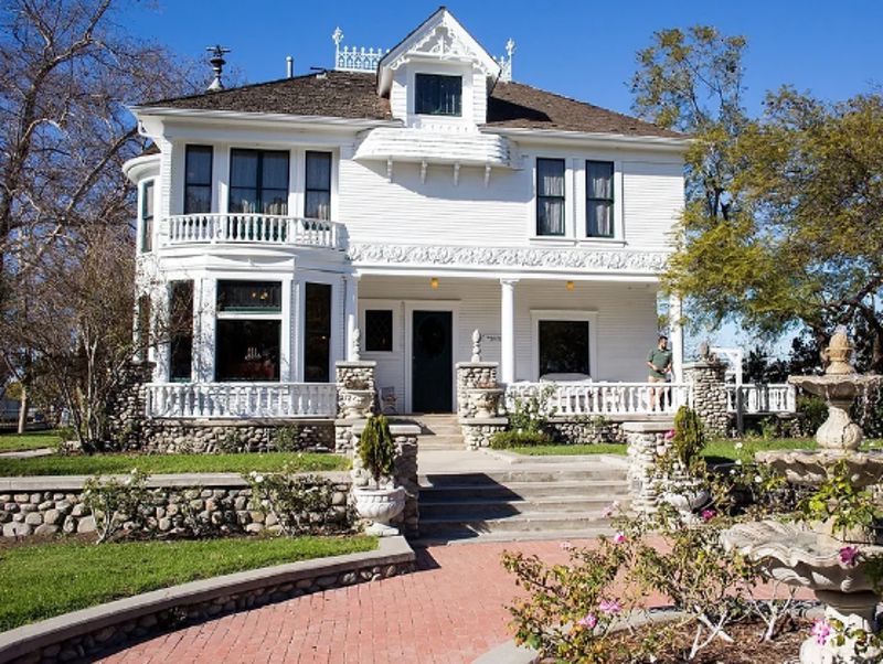 Victorian Estate House with Gazebo, Lawn, and Gated Grounds
