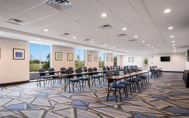 Bright Hotel Meeting Space With Prairie Views and Built-In AV