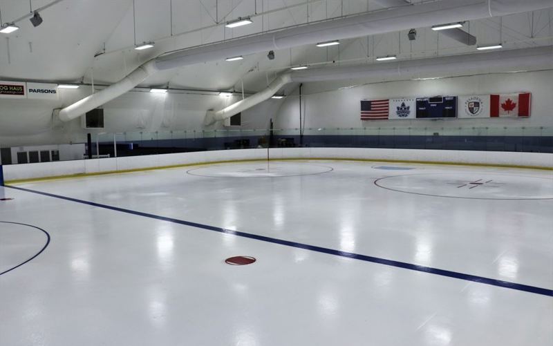 Regulation Ice Rink Party Venue with Flexible Private Event Rooms