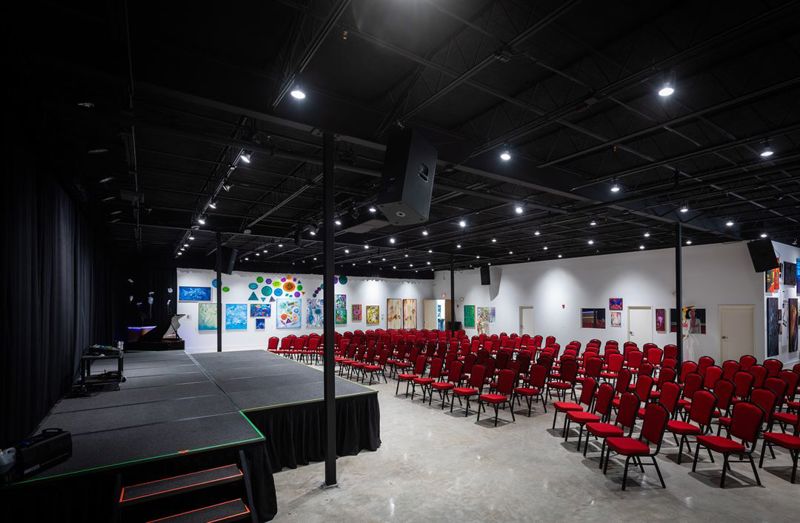 Large Flexible Event Venue with Stage and Industrial Character