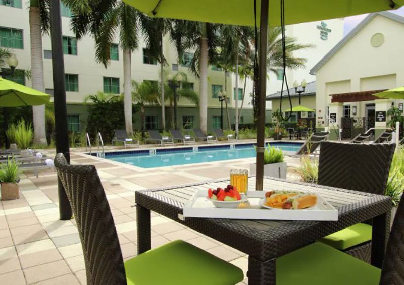 Airport Hotel Meeting Venue with Suites, Shuttle Access and Outdoor Amenities