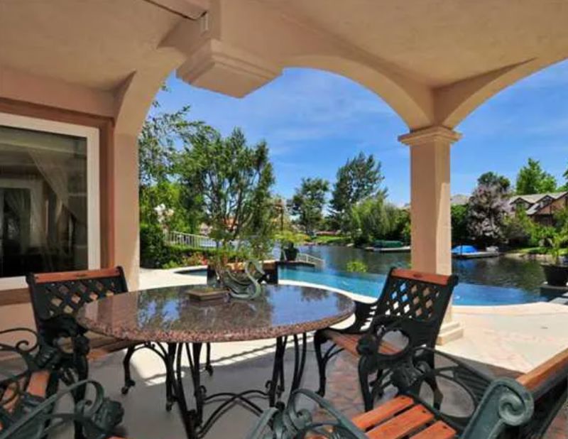 Lakefront Home with Infinity Pool, Boat Dock, Outdoor Bar, and Fire Pit