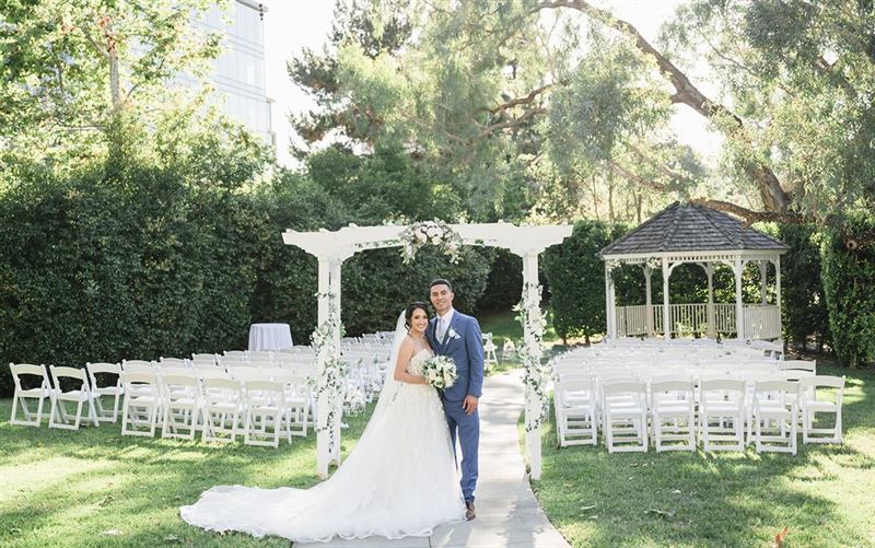 Modern Garden Venue with Pergola, Grand Hall, and Manicured Lawns