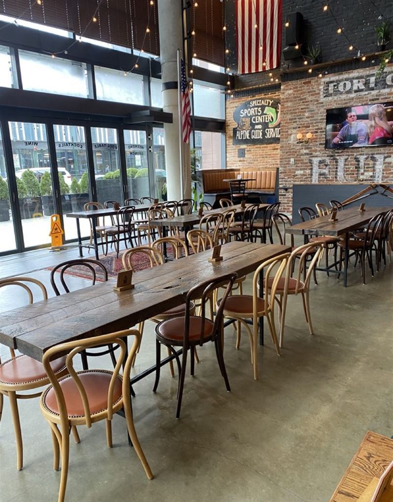 Spacious Brooklyn Hall With Communal Tables and Open Bar Area