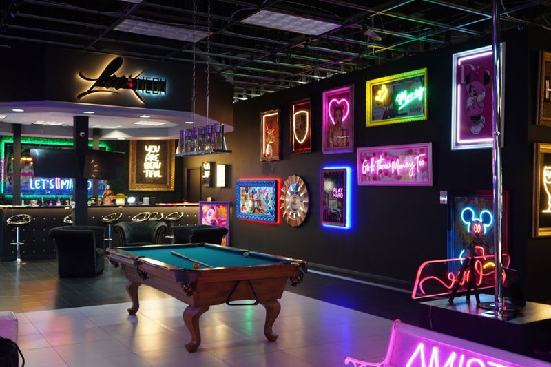 Neon Art Gallery Venue with Immersive Color and Open Event Space