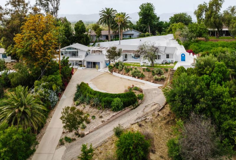 Santorini-inspired Tarzana Home with Pool, Arches, Cabana, and Production Staging