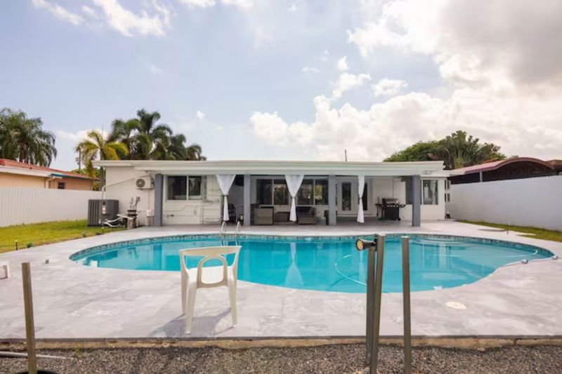 Private Waterfront Pool House with Dock, Patio and Gated Parking