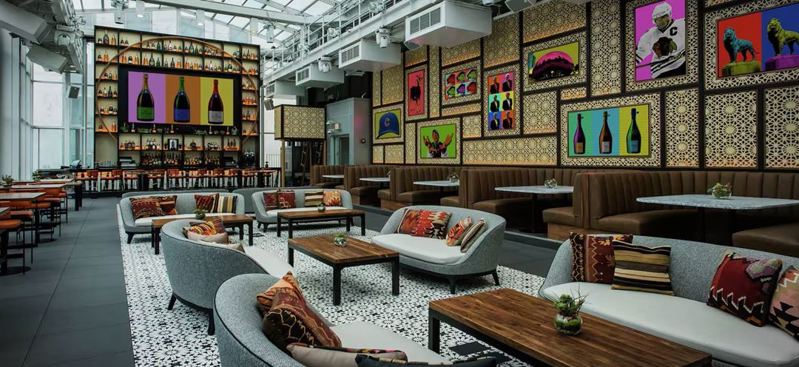Loop Hotel with Rooftop Views, Glass Walls and Private Theater