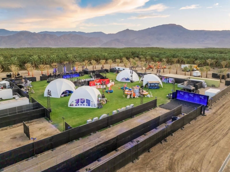 Thermal Open-air Desert Venue with Palm Groves and Festival Scale