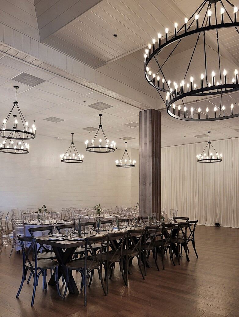 3,000-Square-Foot Banquet Hall With Wood Floors and Wagon-Wheel Chandeliers