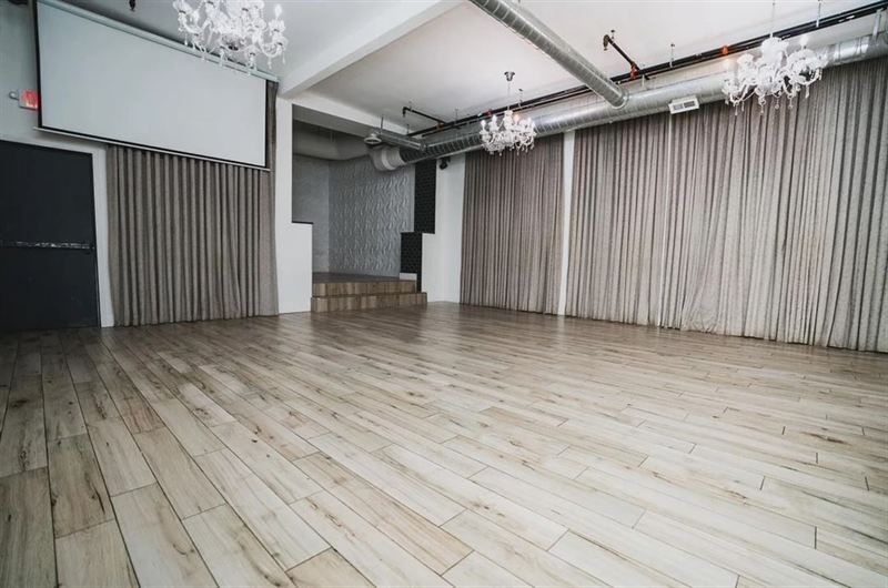 Flexible Staten Island Event Hall With Stage, Bar and Custom Lighting