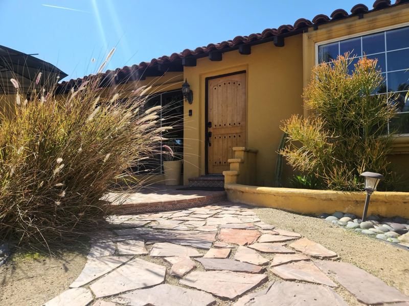Spanish-Style Hacienda with Patios, Fire Pit, and Cactus